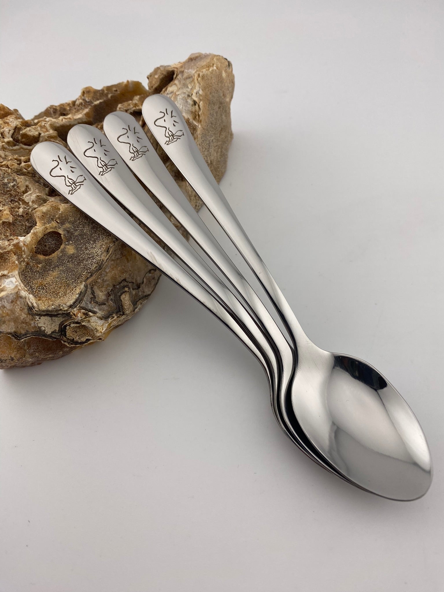 theelepels met logo graveren